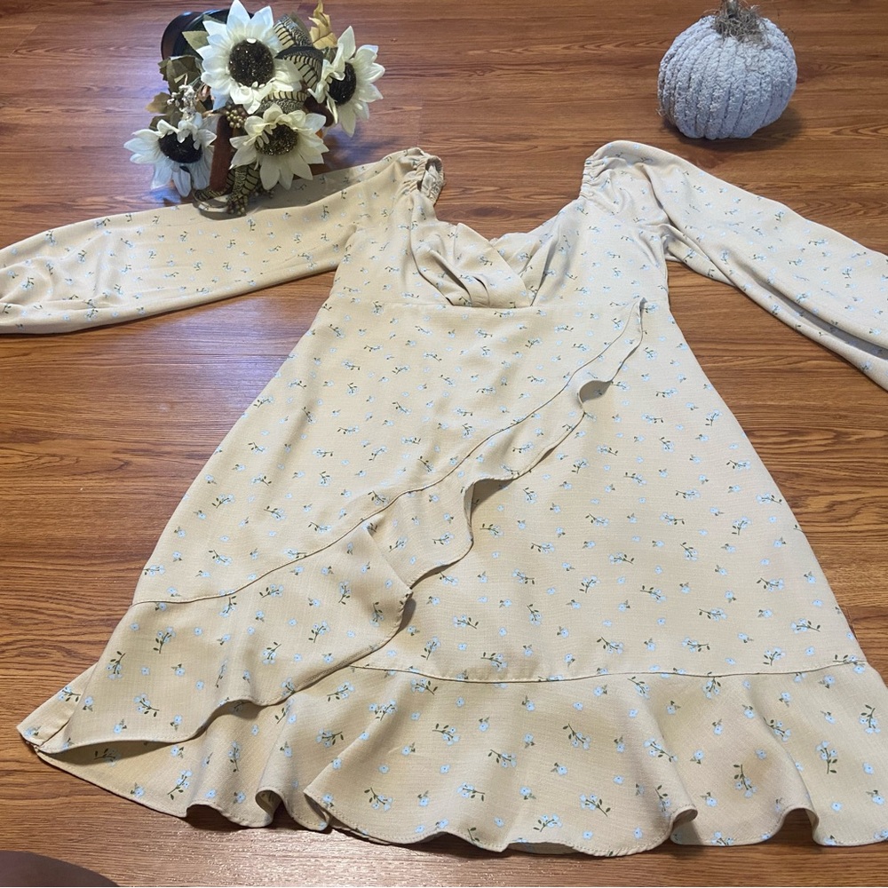 Cream sun dress with blue flowers